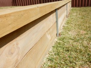Treated timber pine retaining wall